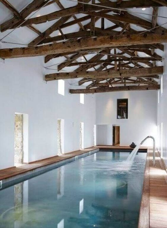 Indoor Swimming Pool With Wooden Rafters