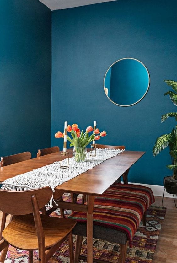 Mid century dining room with blue walls