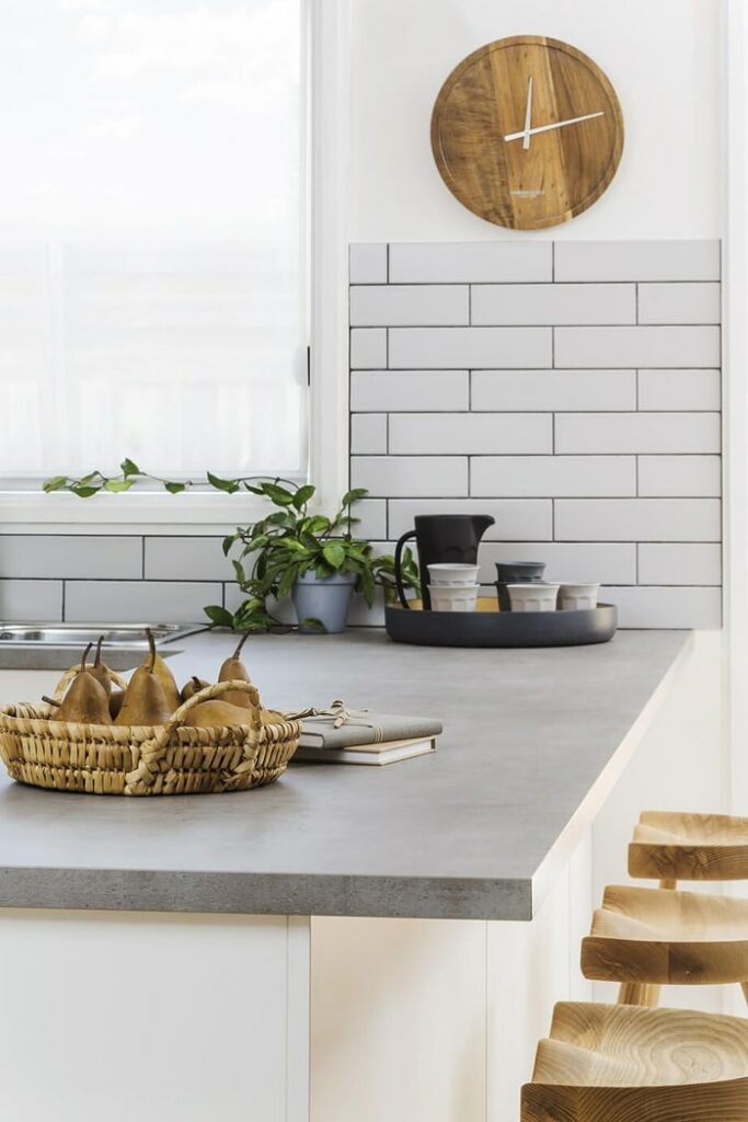 Scandinavian Style Wood Clock In A Modern Kitchen